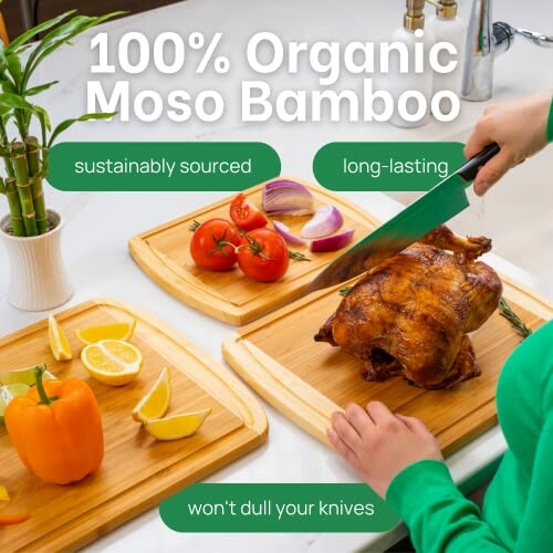 Person cutting roasted chicken on bamboo cutting board with vegetables.