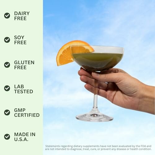 Hand holding a green beverage with health benefits listed.