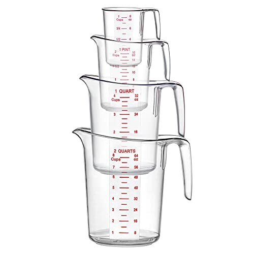 Stacked clear measuring cups with red markings