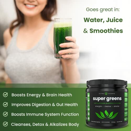 Woman holding green drink with Super Greens supplement container.